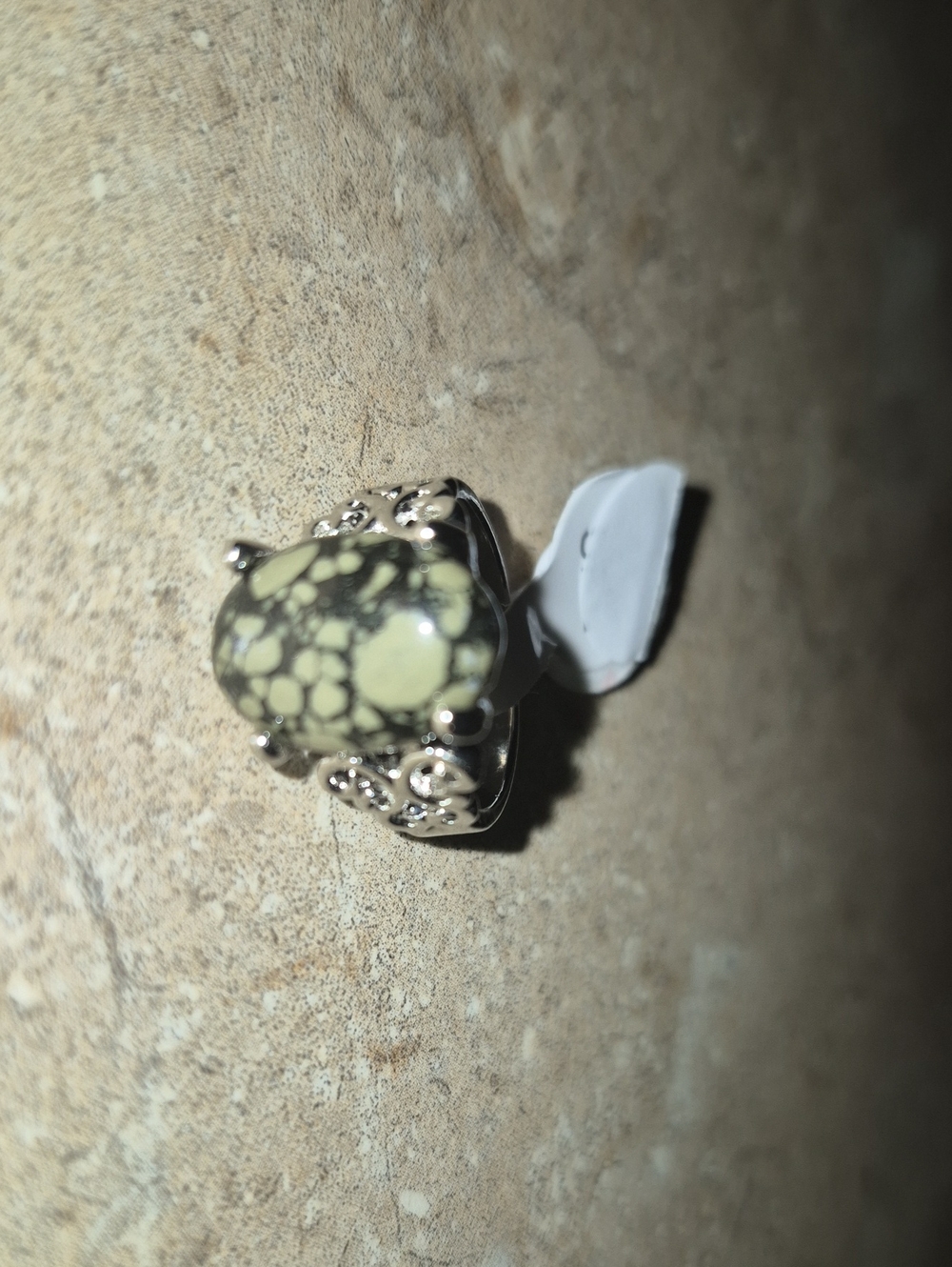 Silver Filigree Ring with Pale Green Spot Pattern Stone